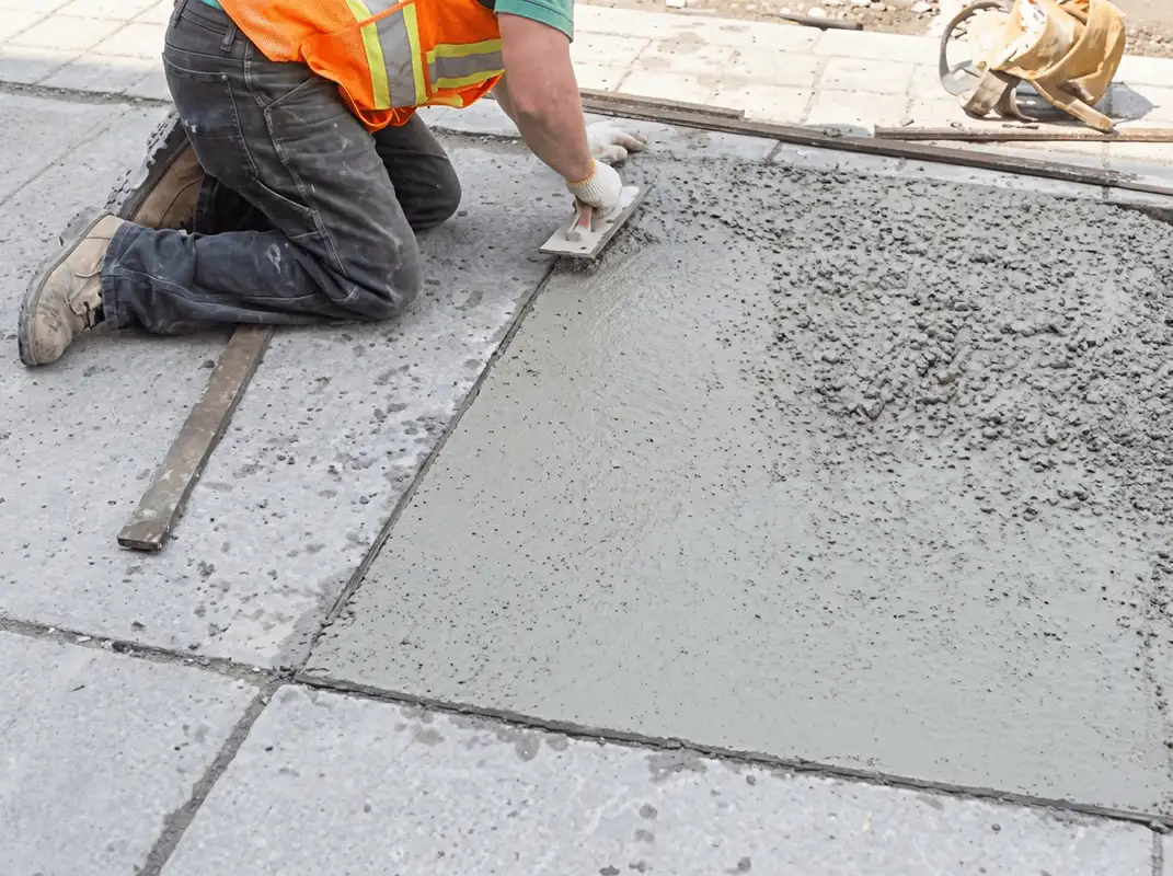 Professional repairing a concrete floor in Kansas City, MO