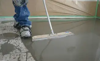 Uneven floor being professionally repaired in Kansas City, MO